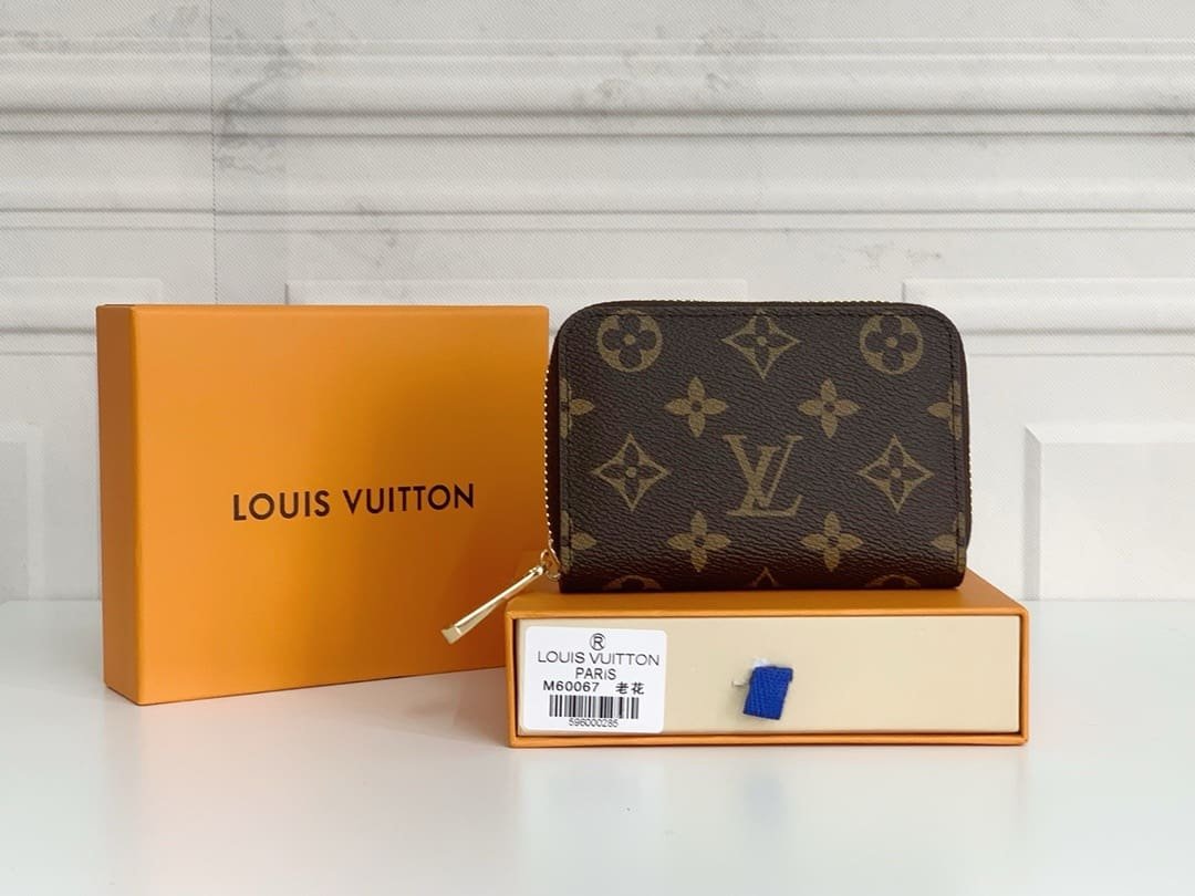 L0vis Vvtt0n M60067 Zippy Coin Purse
